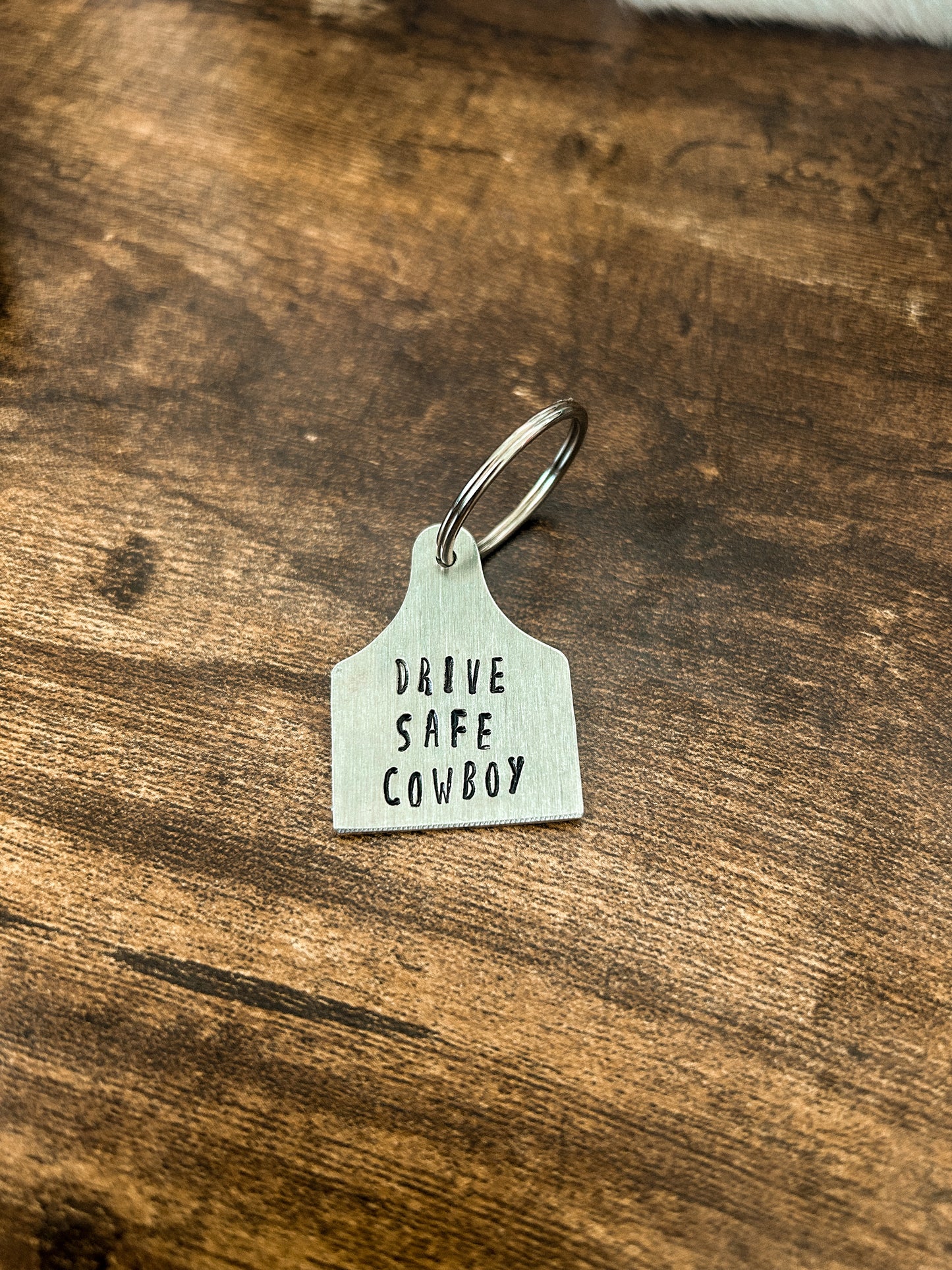 drive safe cowboy keychain