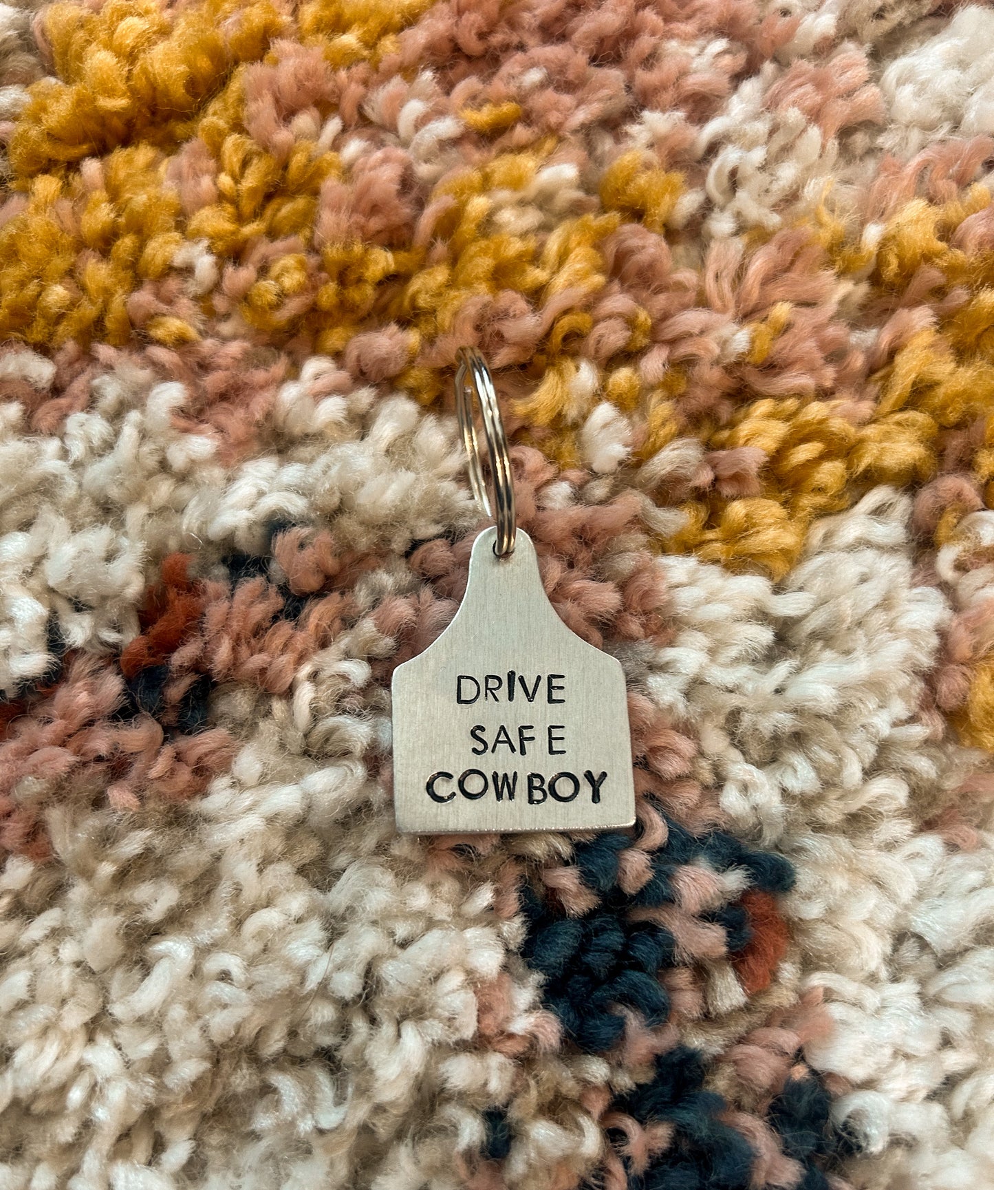 drive safe cowboy keychain