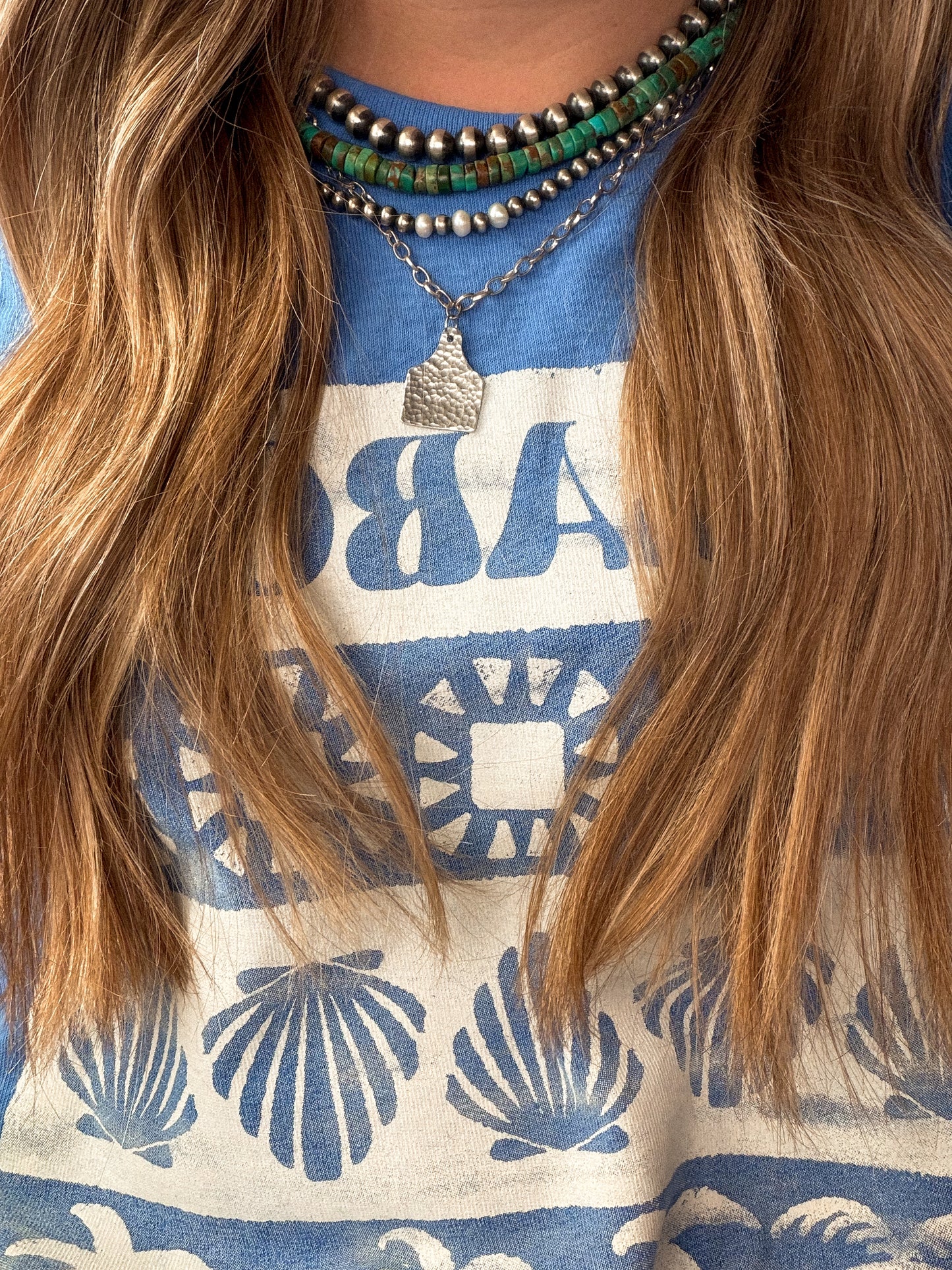 Tex cattle tag necklace