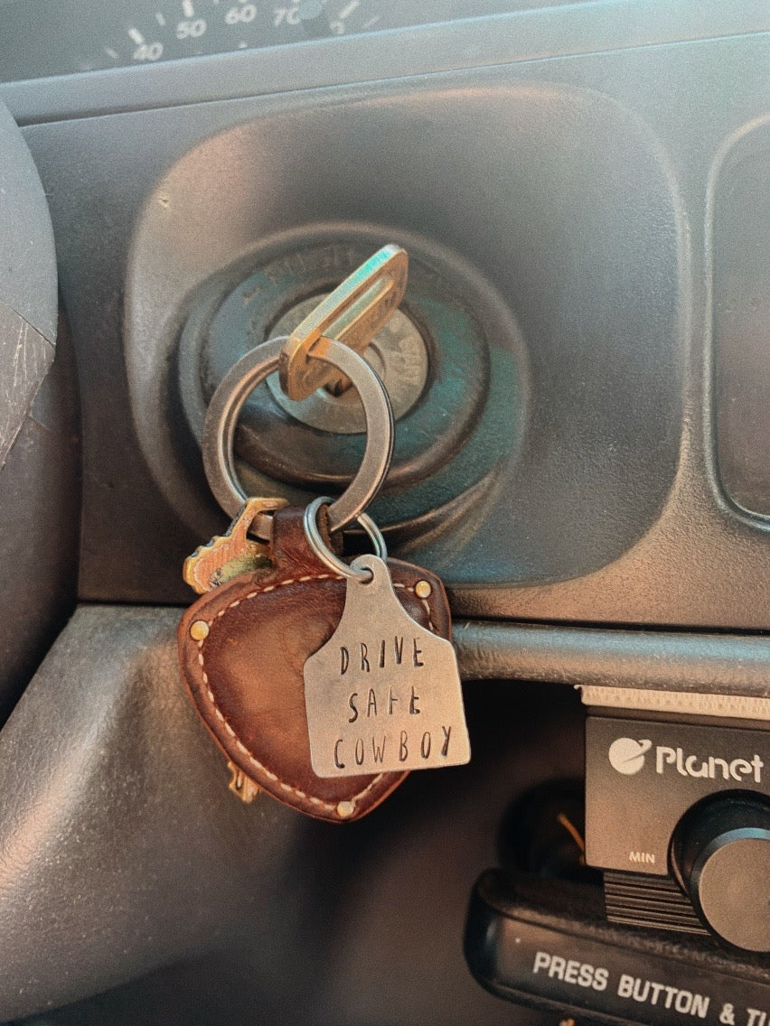 drive safe cowboy keychain