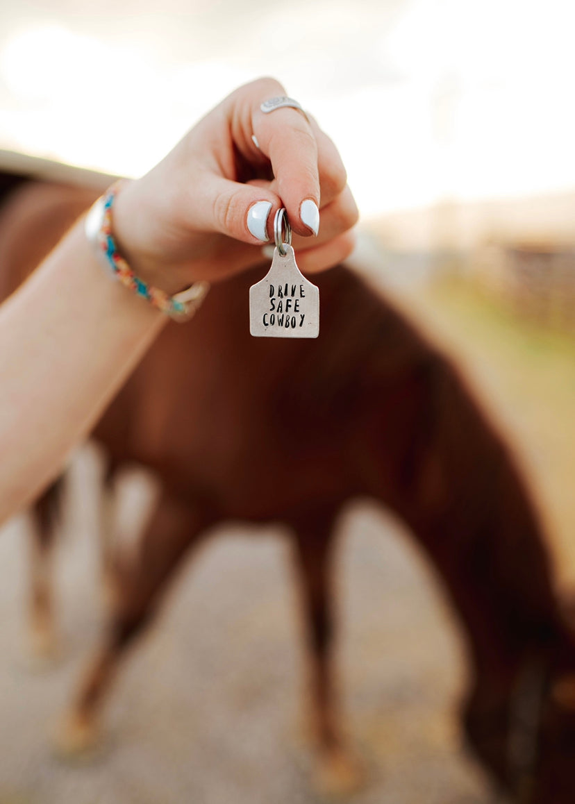 drive safe cowboy keychain