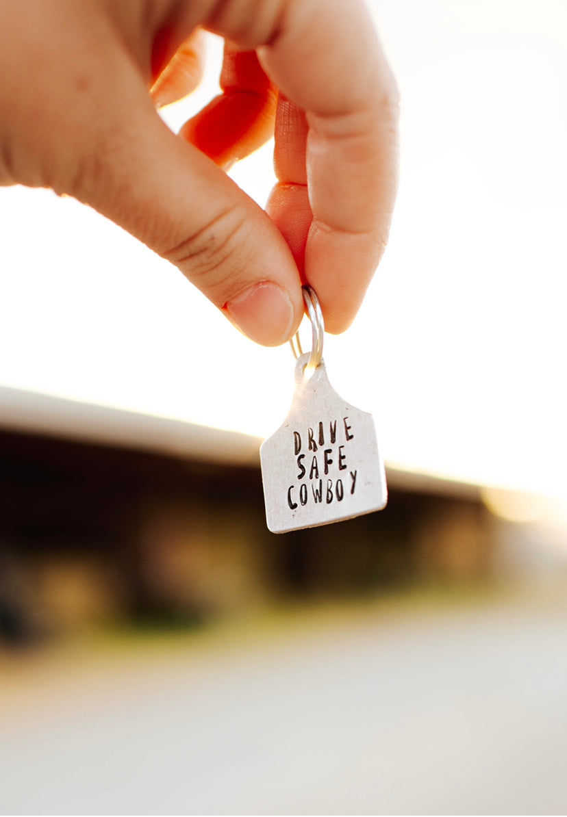 drive safe cowboy keychain